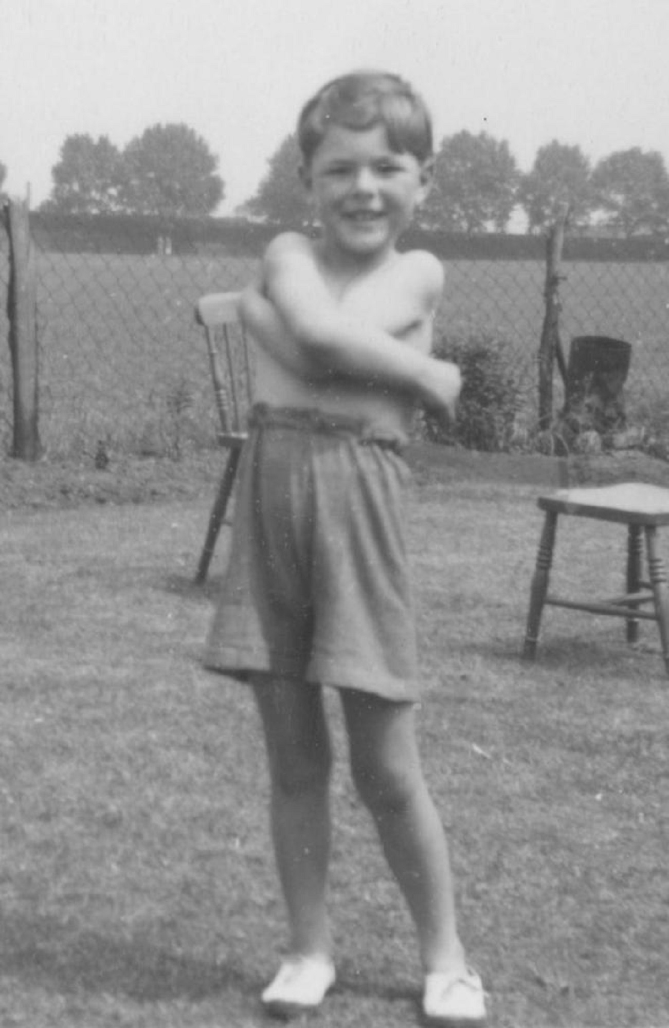 Robert in the prefab garden. Gladstone Park in the background. London NW10