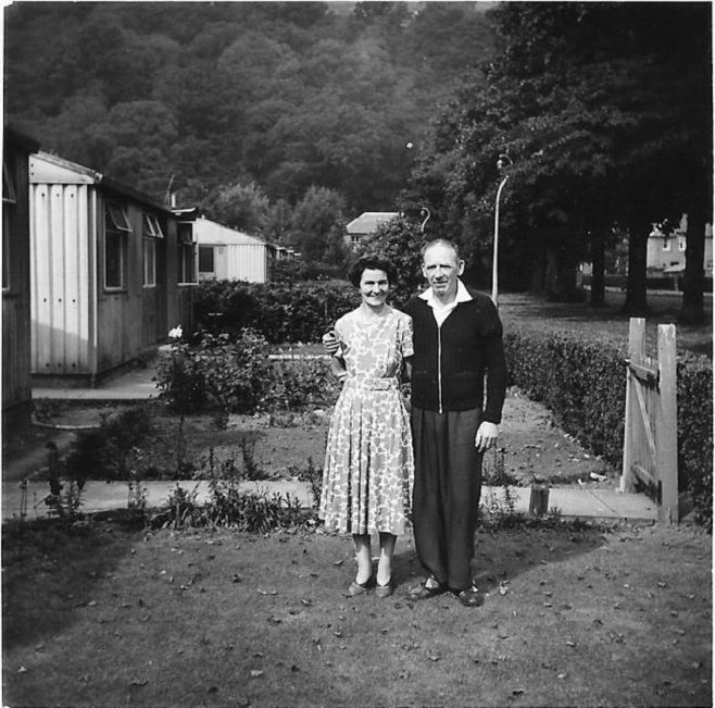 Eddie and Sally McNiven, standing outside their prefab in Windsor Street, Menstrie, Clackmannanshire