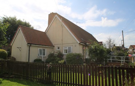 Side view, Swedish dormer bungalow and wash house