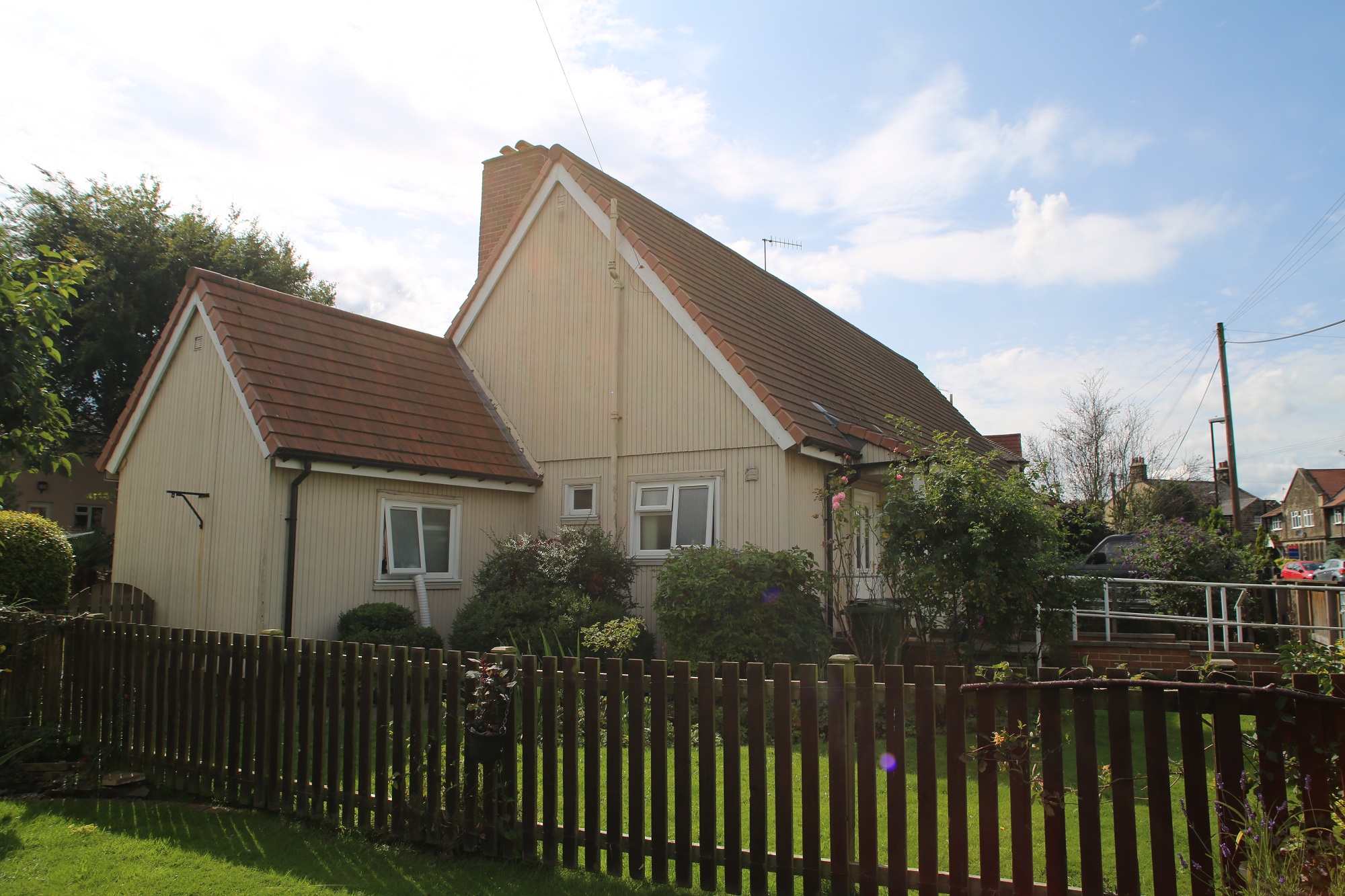 Side view, Swedish dormer bungalow and wash house