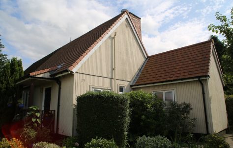 Side view, Swedish dormer bungalow and wash house