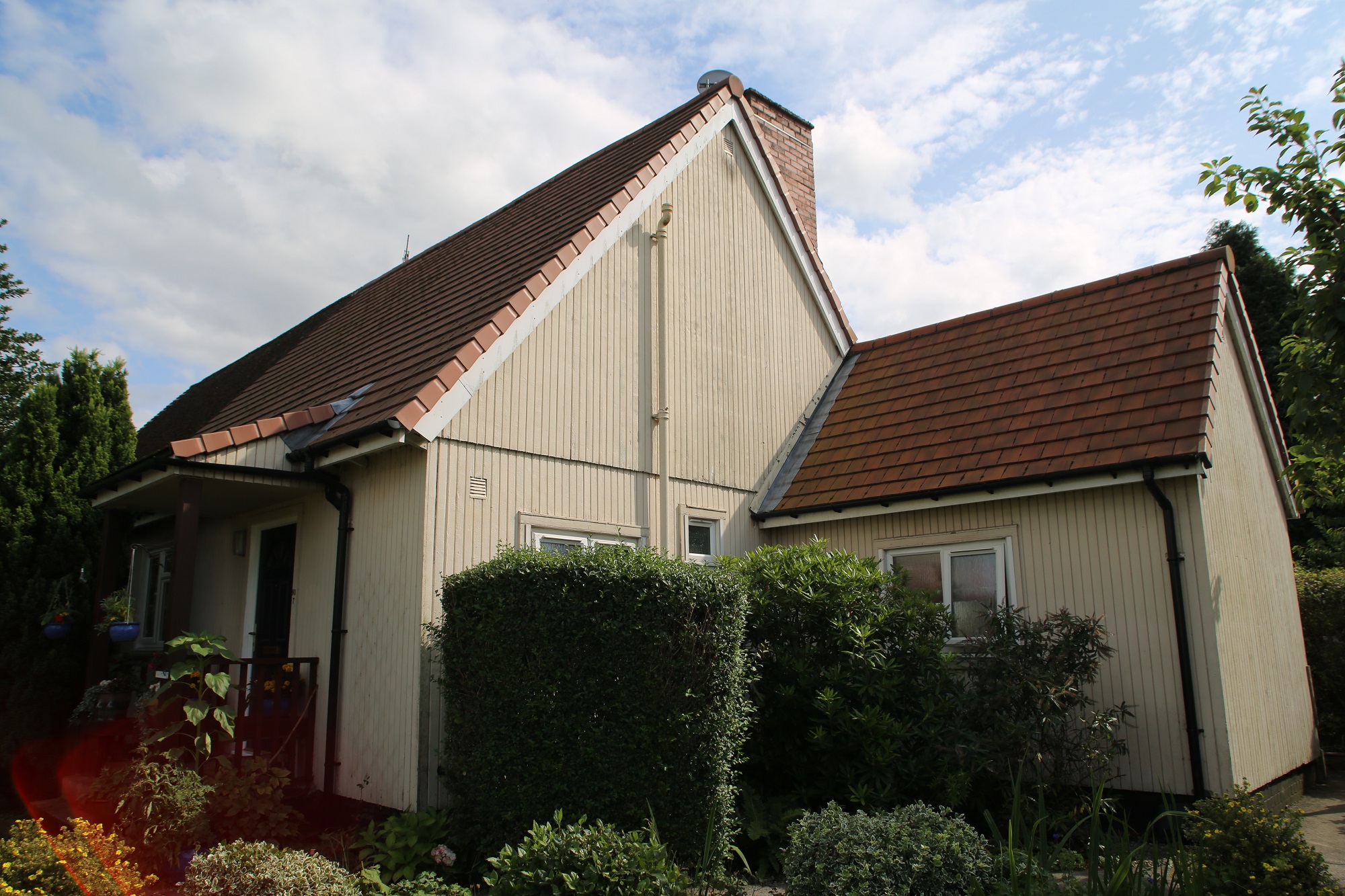 Side view, Swedish dormer bungalow and wash house