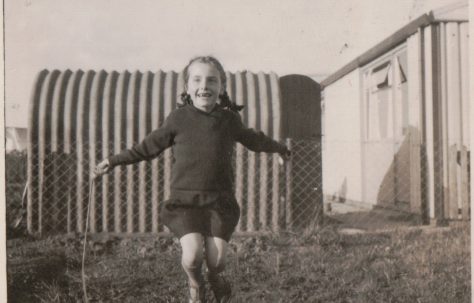 Anne skipping in the prefab back garden, St Andrews Drive, Lincoln