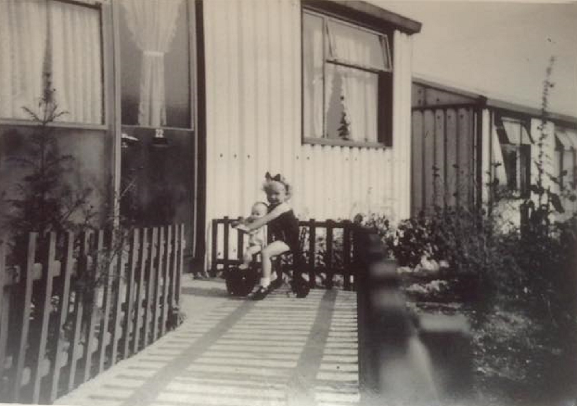 Denise with her dolly and tricycle. Oakwood Hill, Loughton, Essex