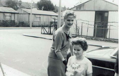 Wedding with Arcon prefabs in the background. Reporton Road, Fulham