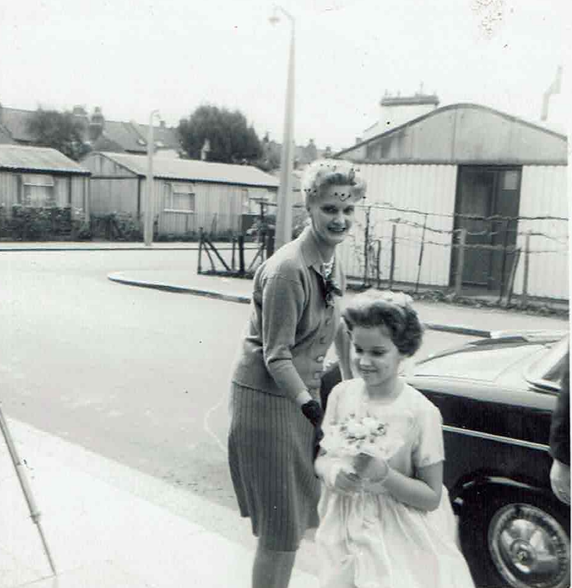 Wedding with Arcon prefabs in the background. Reporton Road, Fulham