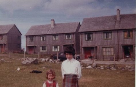 Joan and her sister. Swedish houses, Columba Place, Benbecula