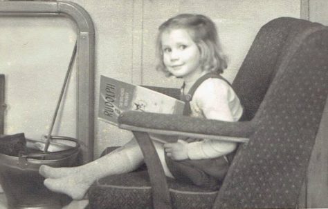 Julie sitting by the fire in the prefab. Cotton Avenue, Acton, London