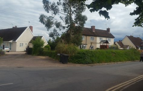 Two pairs of Swedish dormer bungalows and one pair of houses. Oake, Somerset