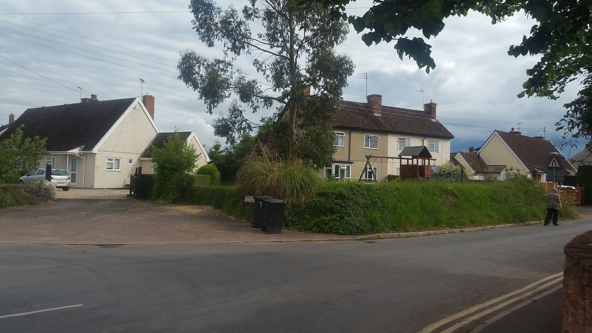 Two pairs of Swedish dormer bungalows and one pair of houses. Oake, Somerset