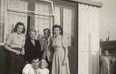 Graham's mother Ivy, his grandmother Amy Pope, her husband Albert and Maddi Nieuwdorp. Front row Graham's father Robert and sister Roberta (aged 2). 849 Ripple Road