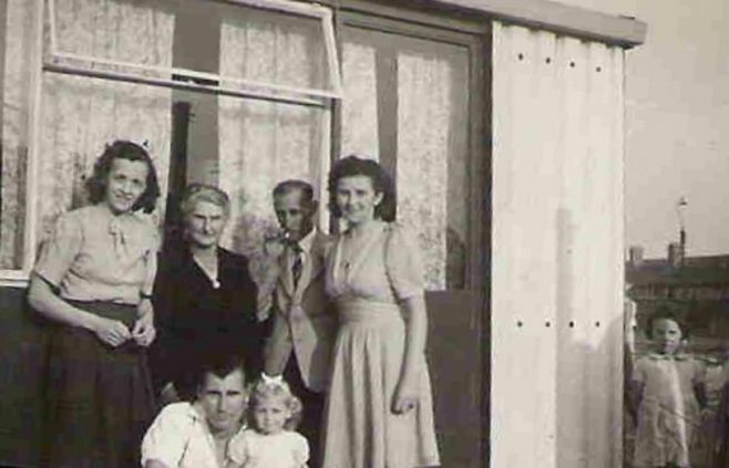Graham's mother Ivy, his grandmother Amy Pope, her husband Albert and Maddi Nieuwdorp. Front row Graham's father Robert and sister Roberta (aged 2). 849 Ripple Road