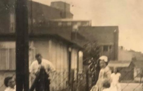 Sue (with bow in her hair) and her mum and dad in the garden. Besson Street, London SE14