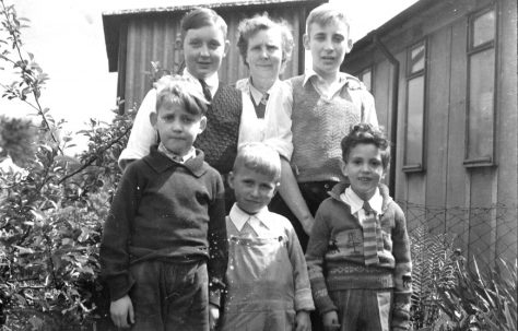 John's cousin Mike left, his Mum and brother Ernie. John is front left, Roy Powell in the middle and Richard Davies right. Reaston Street, London SE14