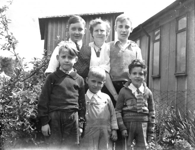 Cousin Mike left, my Mum then my brother Ernie. I am front left Roy Powell in the middle and Richard Davies right.