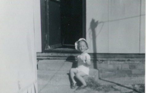 Harry sitting on the prefab steps. Bants Lane, Northampton