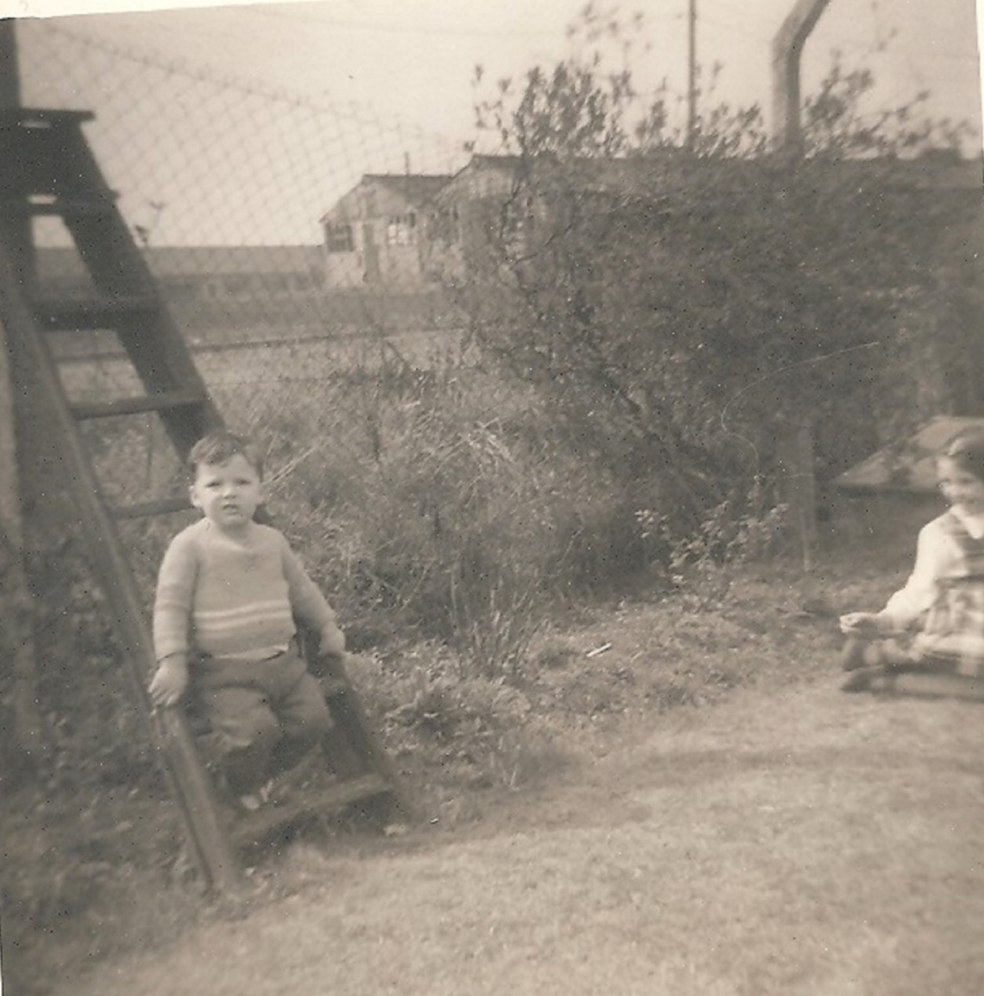 Alan on the stepladder with his sister. Ascot Park, Brent Cross, London