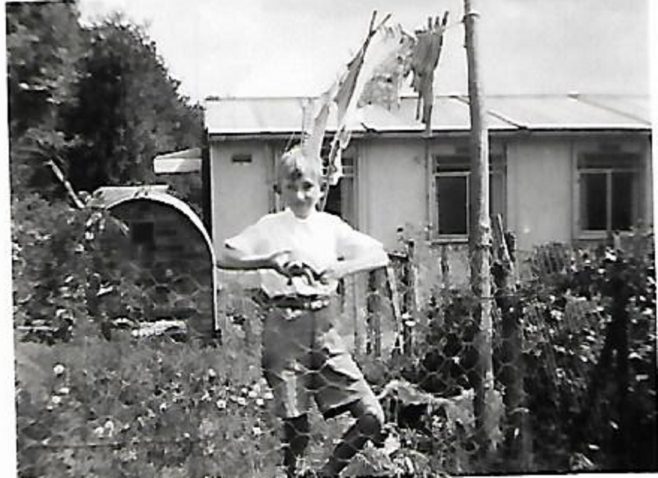 Pat's friend John in the prefab garden, Douglas Road, Lenham | Pat Jessup