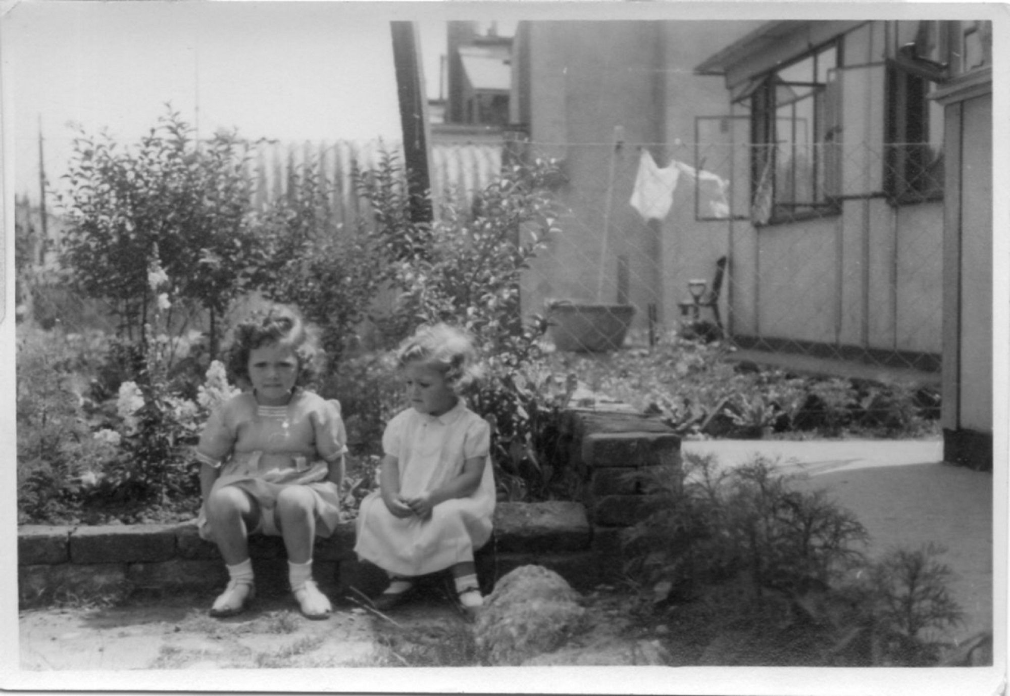 Christine and Pauline Flanders. 7 Hind Grove, Poplar, E.14. late 1940s.