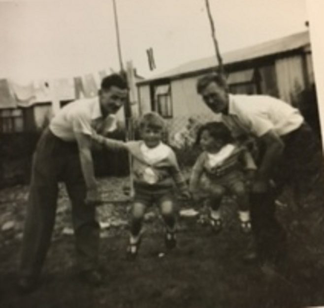Two limbless ex servicemen who could only live in prefabs enjoy games with the kids 1955. 15 Bonchurch Road, Southampton | Geoff Lindsay
