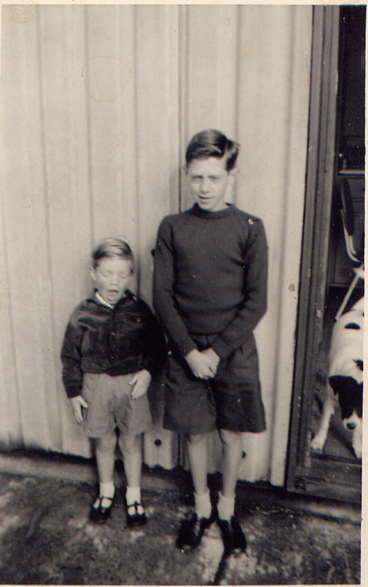 Nick and his brother outside the prefab, Roding Avenue, Barking