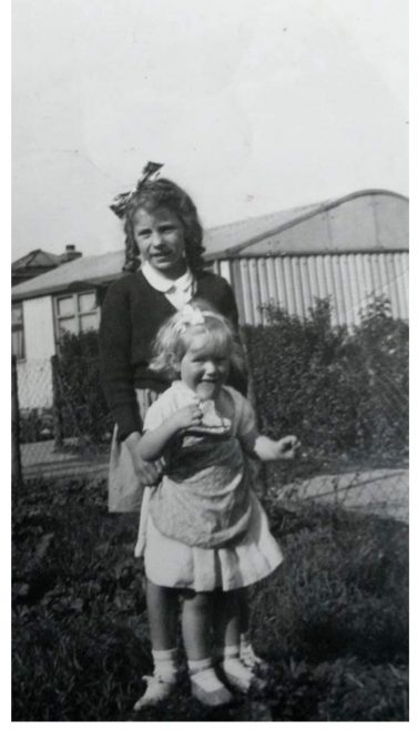 Garry's sister and cousin outside their prefab | Garry Shadbolt