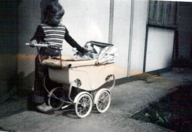 Me with my dolls pram. White City estate, London W12 | Antonia Davis