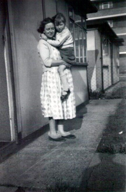 Me with my mum White city flats in the background. White City estate, London W12 | Antonia Davis