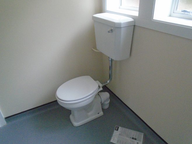 New toilet and cistern, Wake Green Road prefab | Prefab Museum