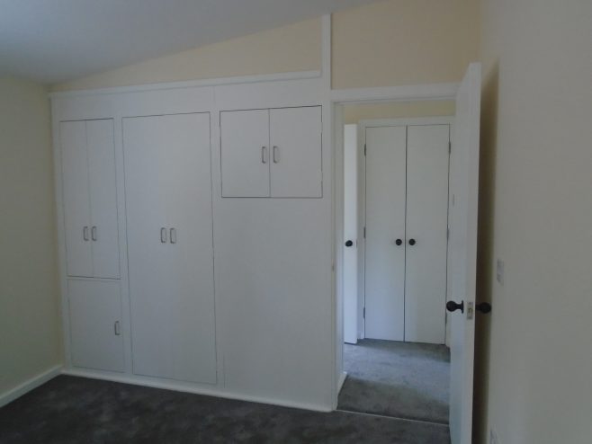 Rebuilt bedroom cupboards, Wake Green Road prefab | Prefab Museum