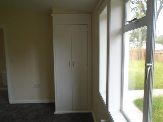 Second bedroom built in cupboard, Wake Green Road prefab | Prefab Museum