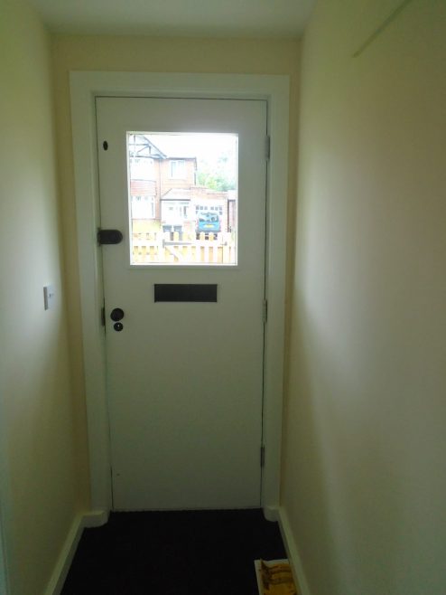 Front door from the hallway, Wake Green Road prefab | Prefab Museum